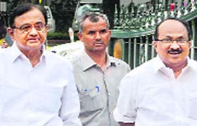 Union Ministers P Chidambaram and KV Thomas (R) after Cabinet meeting in New Delhi