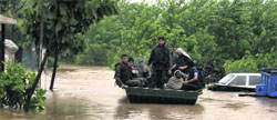 Securitymen rescue villagers in Yamunanagar area.  PTI