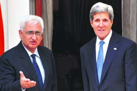 US Secretary of State John Kerry with External Affairs Minister Salman Khurshid in New Delhi on Monday