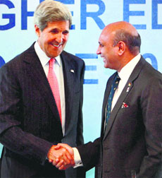US Secretary of State John Kerry with HRD Minister M M Pallam Raju in New Delhi on Tuesday.