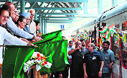 Prime Minister Manmohan Singh and UPA chairperson Sonia Gandhi flag off the Banihal-Qazigund train along with other dignitaries on Wednesday