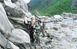 Armymen rescue a person near Pindari Glacier on Thursday.  AFP