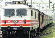 A train approaches the Chandigarh railway station. 