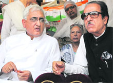 External Affairs Minister Salman Khurshid with JK Congress chief Saifuddin Soz in Srinagar on Friday. 