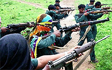 A file photo of Maoists armed with weapons