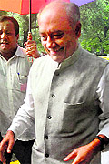 Digvijay Singh, Congress in charge for Andhra Pradesh, leaves after the party's Core Group meeting