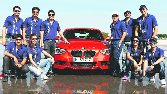 The eight lucky winners with Sachin Tendulkar (first right)