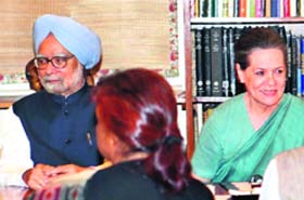 PM Manmohan Singh, Congress president Sonia Gandhi with other leaders at the CWC meeting on Telangana at 10 Janpath in New Delhi on Tuesday