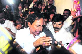 TRS president K Chandrasekhar Rao reacts to the decision on a separate Telangana state on Tuesday