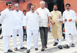 MPs from Seemandhra, who resigned to protest Andhras bifurcation, at Parliament in New Delhi on Friday.  PTI