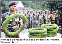 Homage being paid to dead soldiers in Poonch. Tribune photo