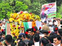 Soldiers carry the coffin of Naik Kundalik Mane at his native village Pimpalgaon in Kolhapur district on Thursday