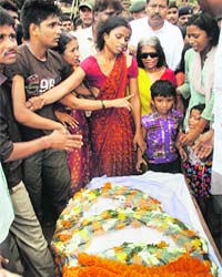 Family members of jawan Vijay Kumar Rai during his cremation at Vyapur in Patna district on Thursday
