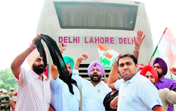 Youth Congress activists disrupt the Delhi-Lahore bus at Amritsar on Friday.