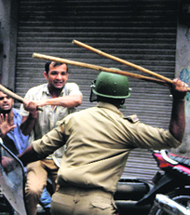 Police and protesters clash during the Jammu bandh against the Kishtwar violence on Saturday.