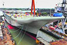 Indigenous aircraft carrier INS Vikrant is docked at Kochi on Sunday.
