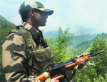 BSF soldiers patrol near the Line of Control in Sabzian Sector of Poonch.  PTI