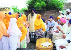 Affected Sikh families of Kupia Plat in Karah Sahib plead their case before former chairman of National Commission for Minorities on Sunday.
