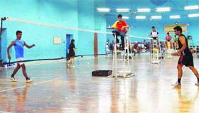 Matches in progress during the Ludhiana Open District Badminton Championship being held at Shastri Hall, Ludhiana, on Saturday