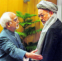 Vice-President Hamid Ansari with his Afghan counterpart Mohammad Karim Khalili in New Delhi on Wednesday