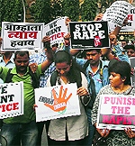 Photojournalists stage a protest in Mumbai on Friday.