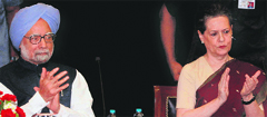 PM Manmohan Singh with AICC chief Sonia Gandhi at the inauguration of the National Media Centre in New Delhi.  PTI