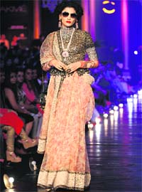 Walk like an Indian: A model showcases a creation by Sabyasachi at Lakme Fashion Week