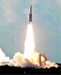 The Ariane 5s heavy-lift launcher blasts off with the GSAT-7 satellite from the spaceport at Kourou in French Guiana. 