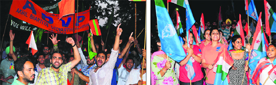Supporters of Akhil Bharatiya Vidyarthi Parishad; and (right) the National Students’ Union of India drum up support on the final day of mass canvassing at Panjab University in Chandigarh on Sunday evening.