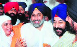 Former SGPC chief Bibi Jagir Kaur congratulates Deputy CM Sukhbir Badal after his re-election as the SAD president in Amritsar on Tuesday.