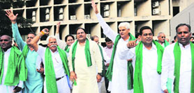 INLD leaders after their suspension for the rest of the session from Vidhan Sabha in Chandigarh. 