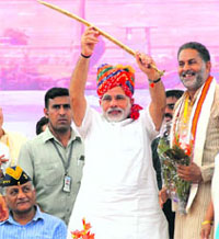 BJP PM candidate Narendra Modi at a rally in Rewari on Sunday. 