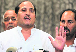 BJP MLA Suresh Rana talks to the media at the Vidhan Sabha in Lucknow on Friday. 