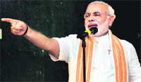 Narendra Modi addresses a BJP rally at Taligaun, near Panaji in Goa. PTI
