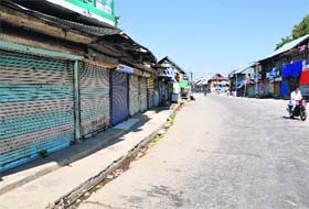The main market wears a deserted look in Shopia as the authorities lifted the curfew from the area on Sunday