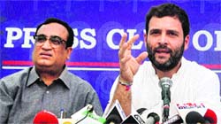 Congress vice-president Rahul Gandhi addresses mediapersons along with party leader Ajay Maken in New Delhi on Friday.