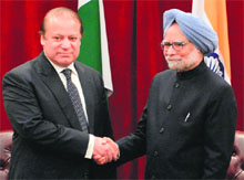 PM Manmohan Singh shakes hands with his Pakistani counterpart Nawaz Sharif at a meeting in New York on Sunday. 