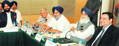 Tata Group chairman Cyrus Mistry, Punjab CM Parkash Singh Badal, Deputy CM Sukhbir Singh Badal and Industry Minister Madan Mohan Mittal in Amritsar on Saturday.