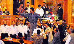 A member of the PDP protests in the J-K Assembly on Wednesday