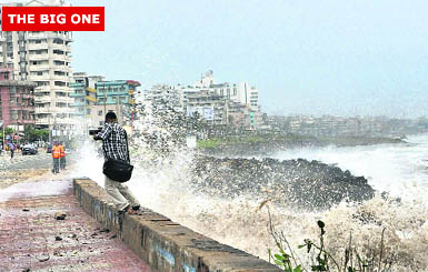 Massive waves crash into the breakwater along a promenade in Visakhapatnam, Andhra Pradesh, on Saturday. 