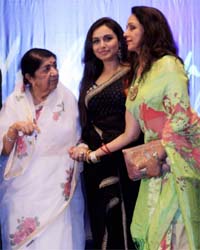 Together they stand: Veteran playback singer Lata Mangeshkar along with Rani Mukherjee and Hema Malini during the Yash Chopra National Memorial awards night in Mumbai