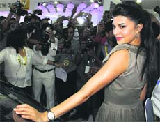 In the auto mode: Bollywood actress Jacqueline Fernandez poses during the Autocar Performance Show 2013 exhibition in Mumbai