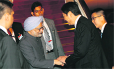 PM Manmohan Singh being welcomed by Chinese officials in Beijing on Tuesday.