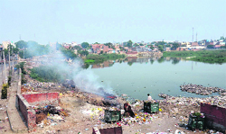 A portion of the pond located near DAV College in Mehna village has been encroached upon by locals.