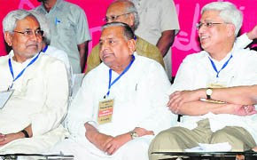 Bihar CM Nitish Kumar, SP chief Mulayam SIngh Yadav and CPI leader Prakash Karat during a convention in New Delhi on Wednesday.