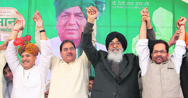 Congress MP Rao Inderjit Singh, INLD leader Abhay Chautala, Punjab CM Parkash Singh Badal and BJP leader Mukhtar Abbas Naqvi at a rally in Kurukshetra on Friday. 