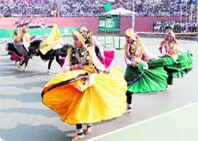 Colourful start: Artistes perform Haryanvi dance during the inauguration of the 14th All-India Police Lawn Tennis Championship at the CLTA in Sector 10, Chandigarh, on Thursday