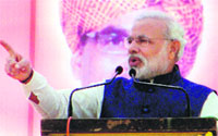 BJP PM candidate Narendra Modi addresses an election rally in Chhatarpur, Madhya Pradesh on Monday. PTI