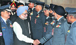PM Manmohan Singh with defence commanders at a conference in New Delhi on Friday.