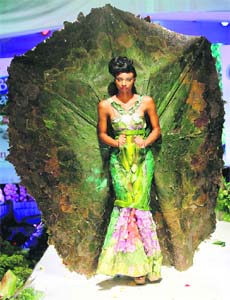 A green thought: A model presents a creation during a biofashion show in Cali. The designs are made from plants, recycled and natural materials